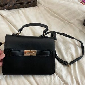 Black/gold crossbody bag. Good/new condition. $10